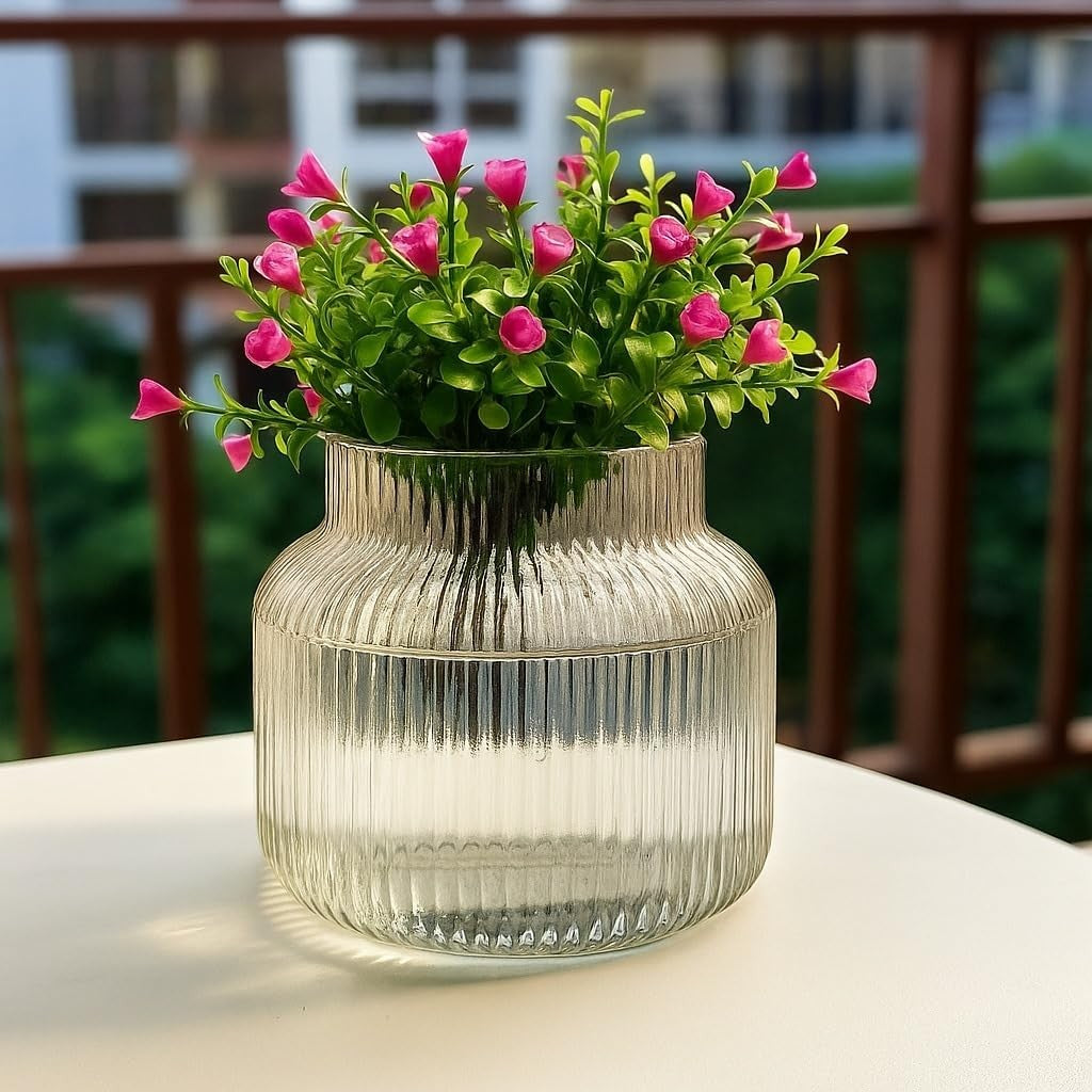 Periwinkle Azolla flower vase for home and office, showcasing a sleek ceramic design with fresh flowers inside.
