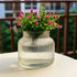 Periwinkle Azolla flower vase for home and office, showcasing a sleek ceramic design with fresh flowers inside.