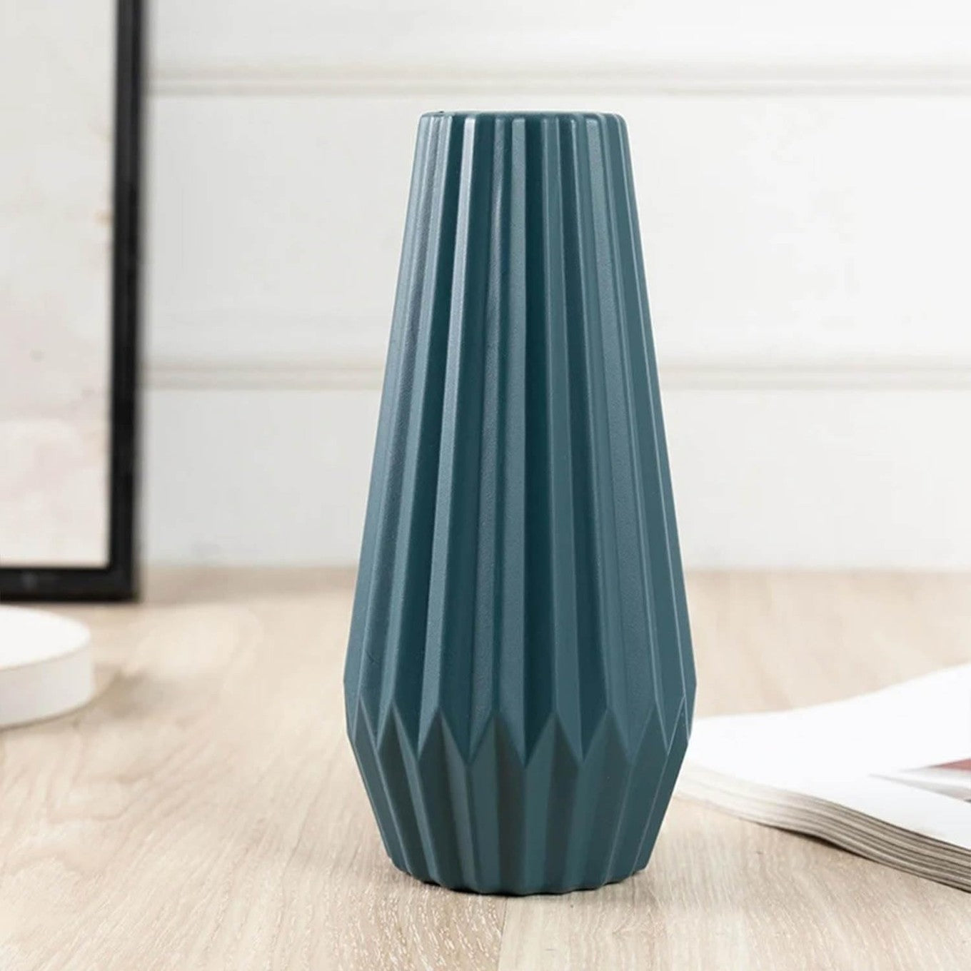 Periwinkle Azolla luxury flower vase for home decor, featuring elegant design and floral arrangement on a modern table.