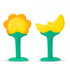 Coffee Eos Sun Moon silicone baby teether in bright yellow and orange with sun and moon shapes, perfect for soothing infants.
