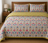 Amber Cronus washable cotton bedsheet with smooth finish, neatly spread on a bed, showcasing soft, high-quality home bedding.