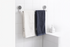 Wall mounted storage shelf for kitchen items by Ultramarine Nyx, featuring a sleek design with multiple compartments for organization.