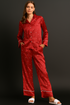 Elegant red satin pajama set with polka dots for women, featuring a comfortable fit from Ultramarine Selene.