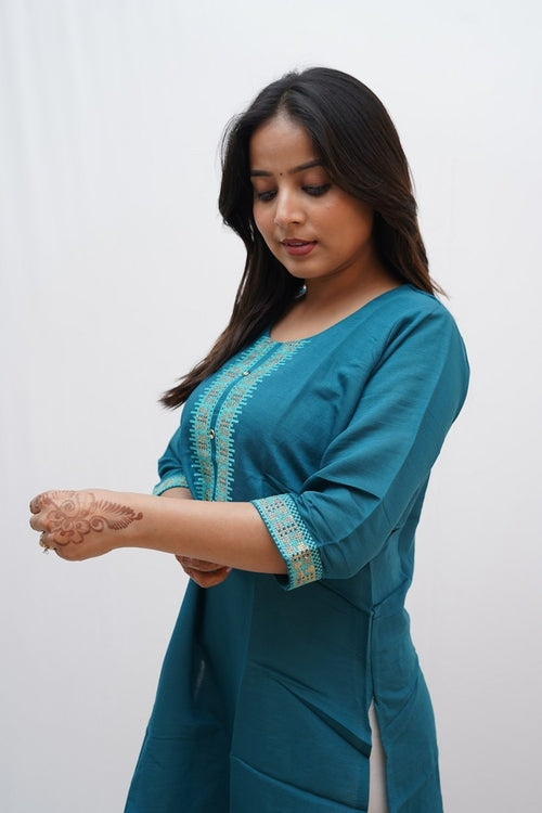 Elegant Copper Eurybia rayon knee-length kurti for women with intricate embroidery, featuring a sophisticated design and comfortable fit.