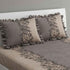 Brown and beige fitted polycotton bedsheet set from Lilac Hercules, showing smooth fabric on a neatly made bed.