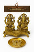 Brass Lakshmi Ganesh Puja Set with accessories, featuring detailed religious figures, ideal for Hindu worship rituals.