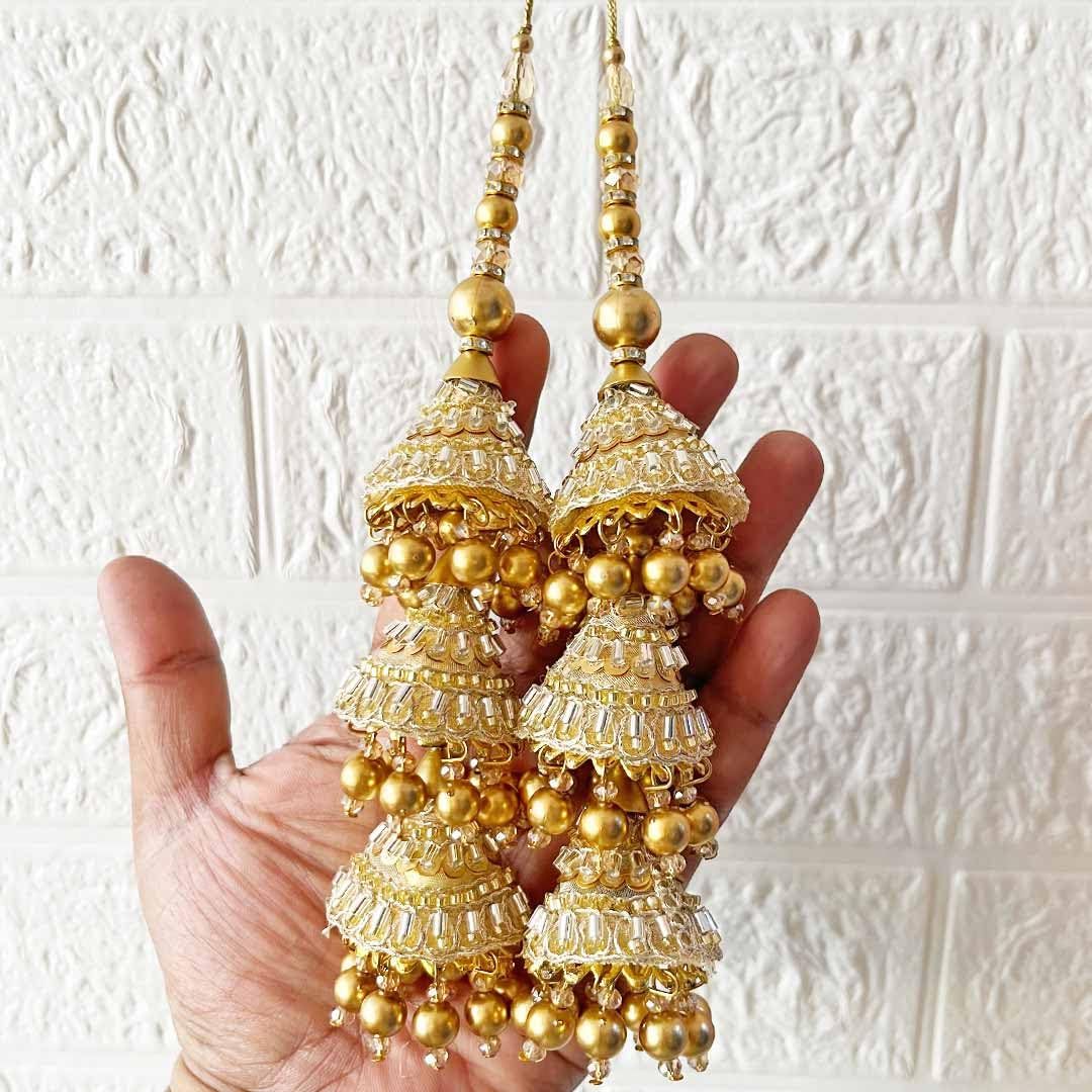 Decorative blouse latkan for women, featuring intricate details and tassels, by Jade Simba for stylish traditional wear.