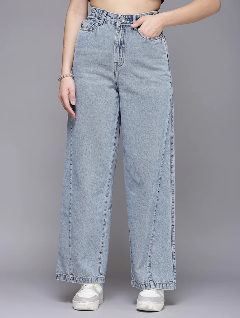 Light blue women’s high rise denim jeans by Ochre Ourea, displayed on a hanger with visible stitching and classic five-pocket design.