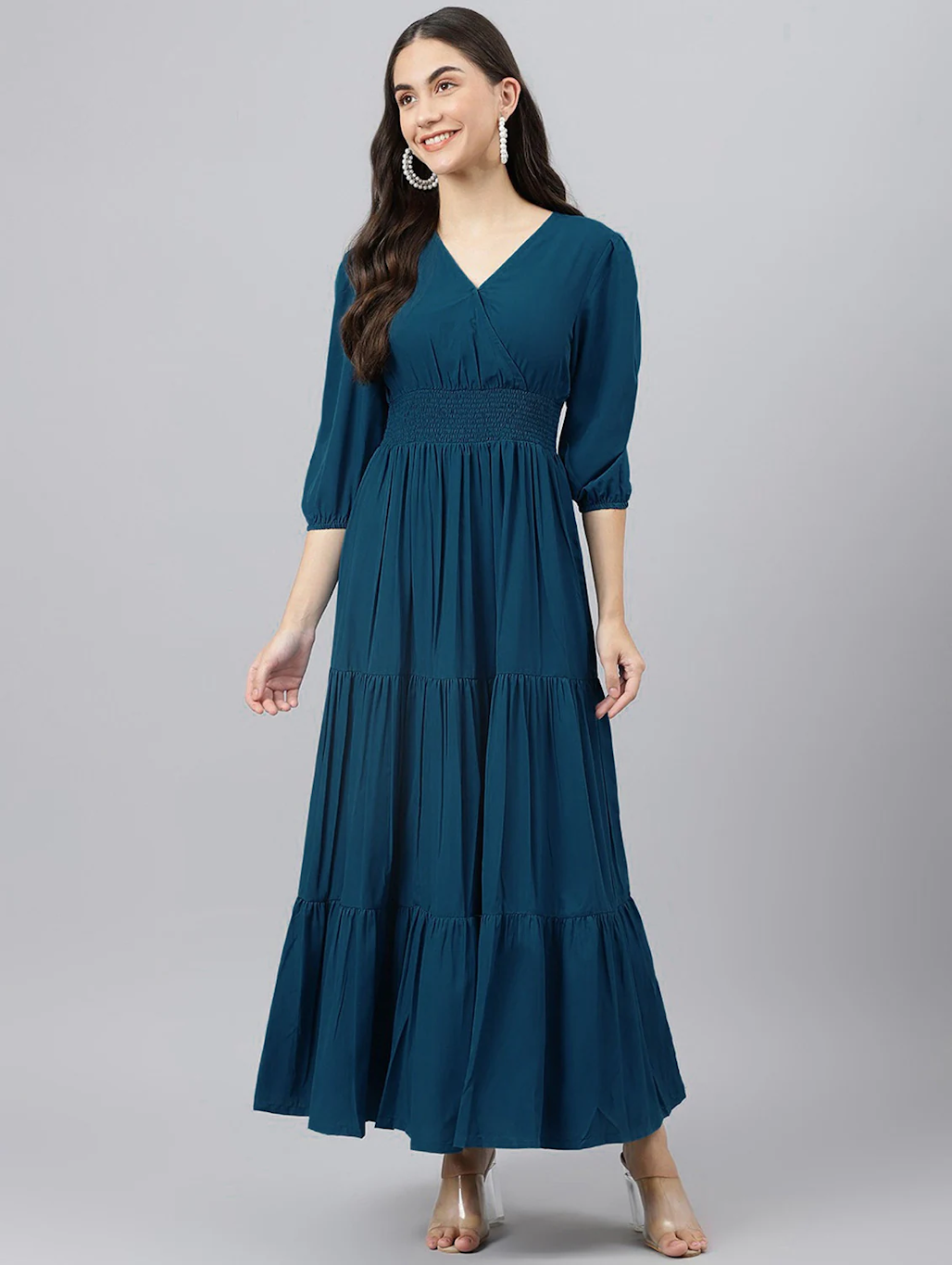 Women’s fit and flare dark blue dress by Gray Iolaus, size M, shown on a model with a flattering silhouette and sleeveless design.
