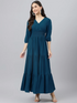 Women’s fit and flare dark blue dress by Gray Iolaus, size M, shown on a model with a flattering silhouette and sleeveless design.