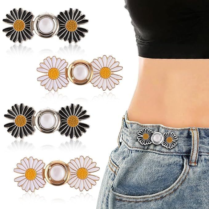 Adjustable jeans waist tightening clips by Erin Smokey, showing metal pins and clips for securing denim at the waist.