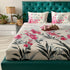 Pink floral cotton double bedsheet from Violet Achilles, showing soft fabric with vibrant floral print for a cozy bedroom decor