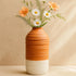 Elegant ceramic vase by Periwinkle Azolla, designed for home decoration with a smooth, glossy finish and decorative shape.