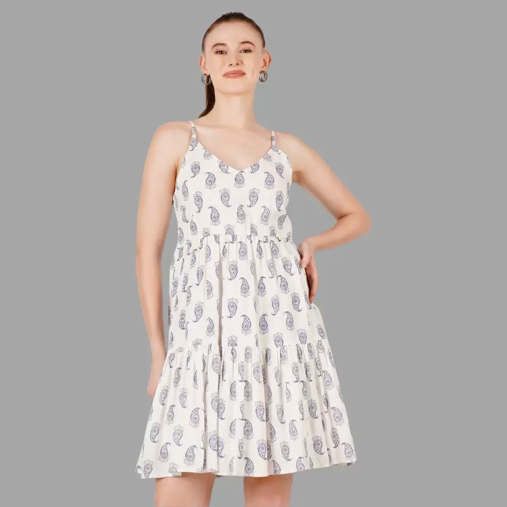 Women’s white midi dress by Emerald Hecuba in size XS, featuring a flattering fit and elegant design, displayed on a hanger.