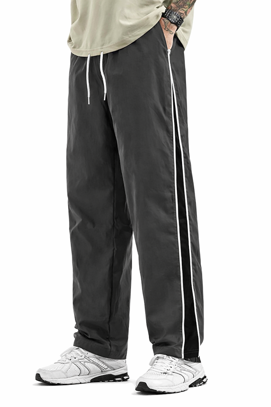Men’s Chocolate Abderus comfortable track pants for gym and running, shown in a casual fit with elastic waistband and tapered legs.