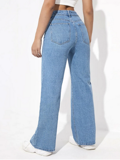 Light blue women’s high rise denim jeans from Ochre Ourea, size 28, displayed on a model with front pockets and cuffed hems.