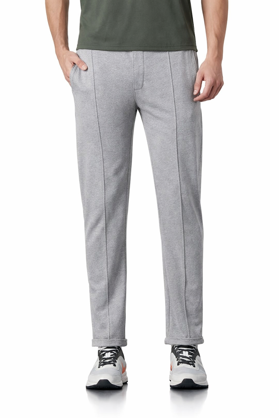 Chocolate Abderus workout track pants with side pockets, athletic footwear designed for comfort and active wear.