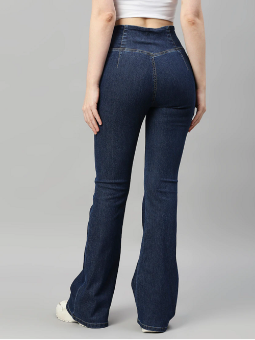 Women’s high rise denim jeans in navy blue by Ochre Ourea, shown on a model, featuring a classic fit and styled for casual wear.