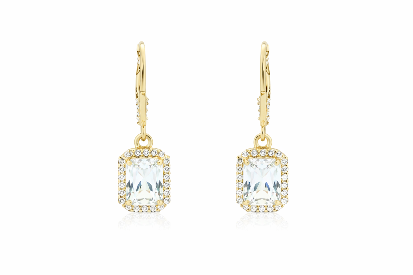 Amber Aether designer earrings for wedding and festive wear, showcasing elegant jewelry with intricate details and sparkling accents.