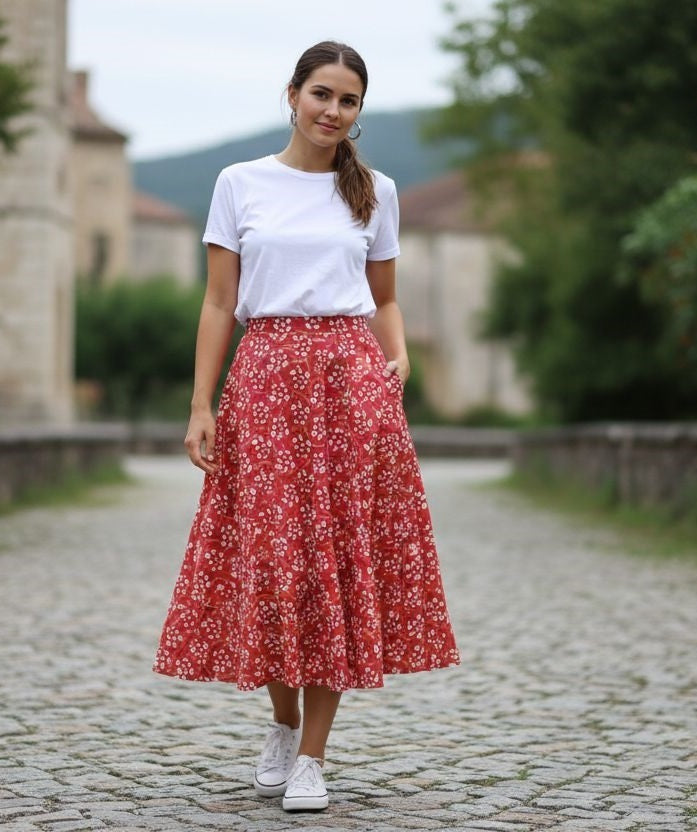 Coral Daisy red floral midi skirt for women, featuring a flowy design and vibrant flower pattern.