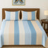 Blue cotton striped double bedsheet set by Violet Achilles, featuring a soft, comfortable fabric ideal for home bedroom decor.