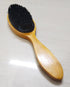 Pear Eucalyptus nylon bristle coat cleaning brush with durable handle, ideal for removing dirt and debris from coats and fabrics.