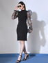 Women’s black floral print dress by Pear Summer Lilac, size M, featuring detailed design and elegant floral pattern.