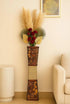 Elegant ceramic vase from Periwinkle Azolla, ideal for living room decor, featuring a smooth white finish and modern design.