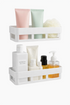 Ultramarine Nyx wall shelf rack for bedroom decor, wooden design with two shelves mounted on a white wall in a cozy bedroom setting.