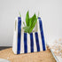 Periwinkle Azolla designer flower vase for tabletop decor with intricate floral patterns on ceramic surface.