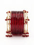 Magenta Trillium wedding designer bangle set featuring intricate gold and gemstone accents, perfect for special occasions.