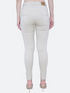 Beige high rise denim jeans for women from Ochre Ourea, shown on a hanger with visible stitching and classic five-pocket style.