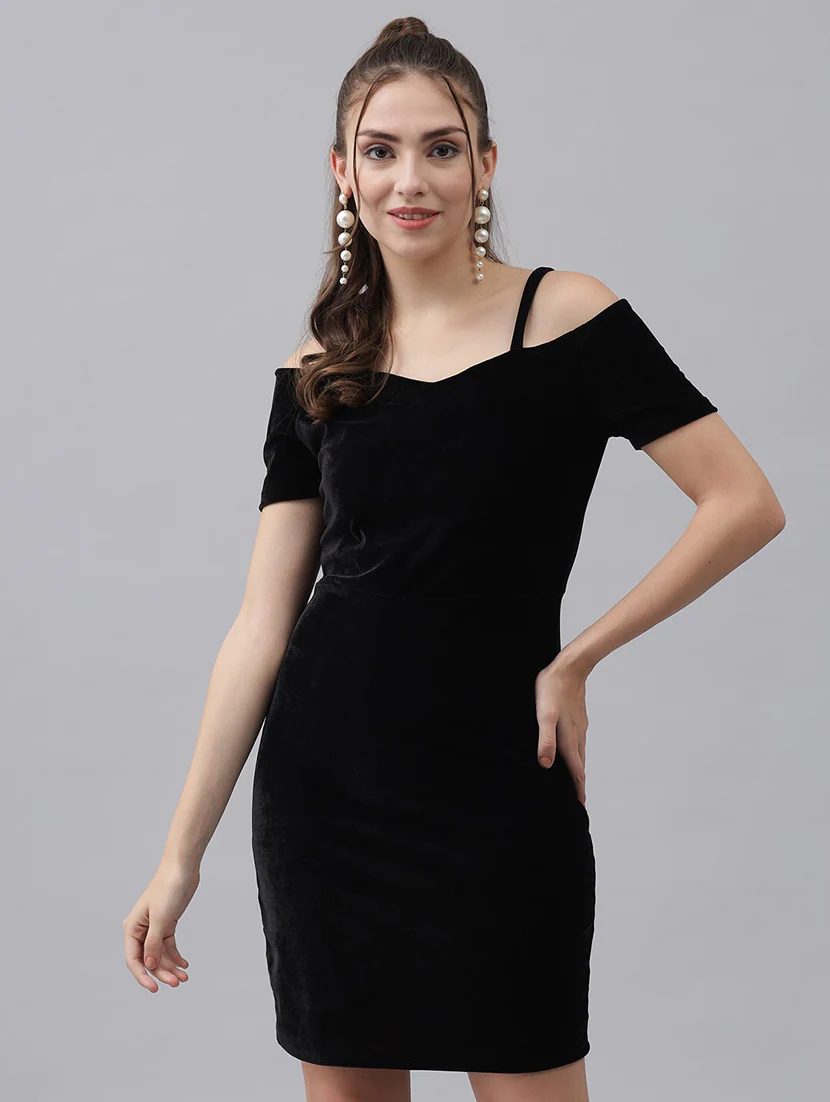 Women’s black velvet bodycon dress in size M by Pear Summer Lilac, form-fitting style with long sleeves and elegant neckline.