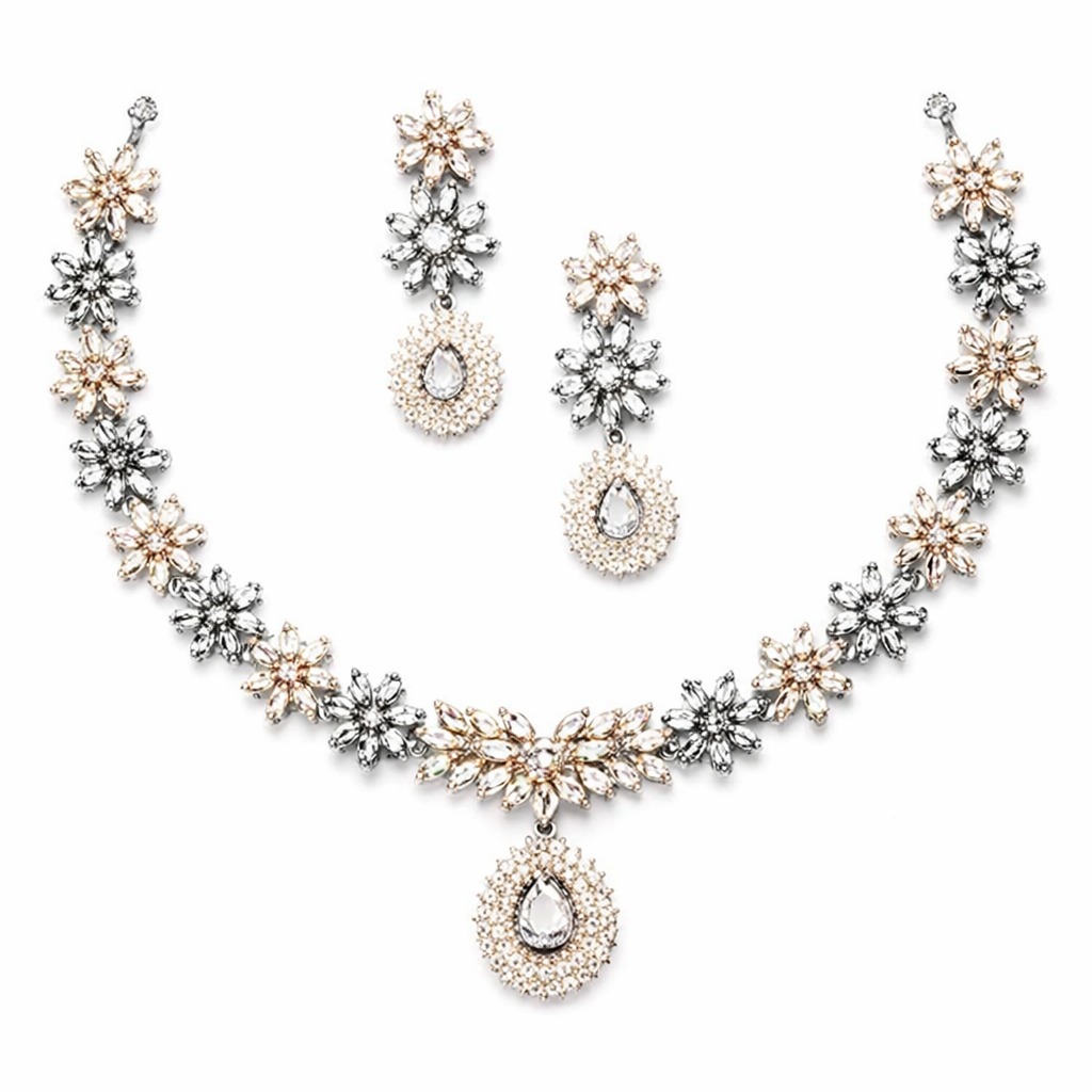 Elegant bridal jewelry set by Bronze Perseus featuring a necklace, earrings, and matching accessories for wedding attire.