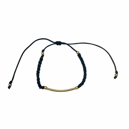 Gold bar-string bracelet from Ariel, a stylish jewelry piece with sleek gold bars on a delicate chain.