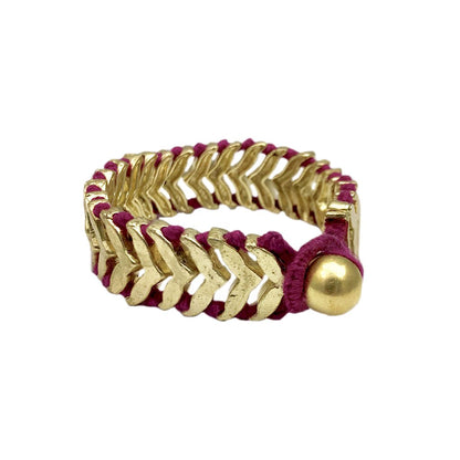 Gold Rina Temple bracelet by Ariel, a statement cuff design with intricate detailing and a polished finish.