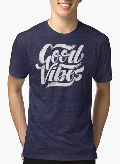 Purple Scorpius Good Vibes Feel Good T-shirt with bold text, casual fit, worn by a model in a relaxed setting.