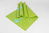 Green printed PVC premium yoga mat by Azure Jason, textured surface ideal for yoga and exercise routines.