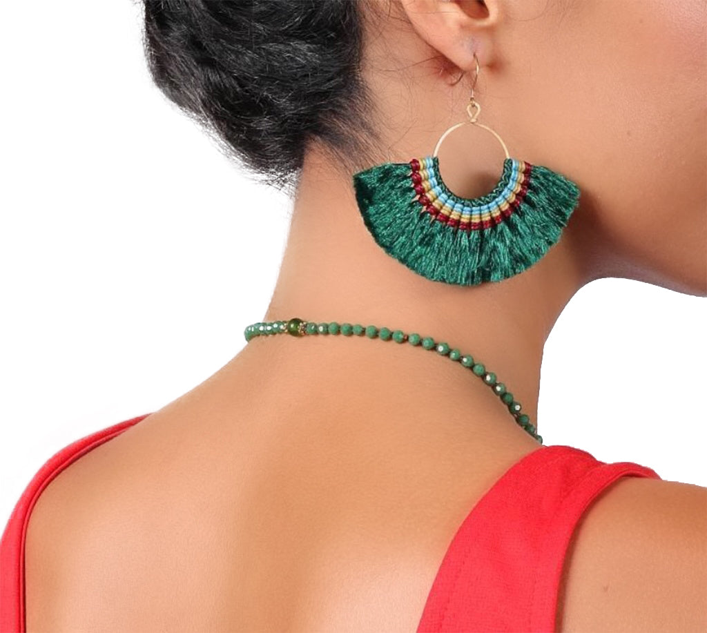 Green boho tassel earrings by Ariel featuring vibrant tassels and intricate design for a stylish, fashionable look.