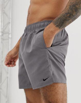 Grey swim shorts by Sky Felix, shown on a model, with a relaxed fit and casual style perfect for beach or poolside wear.