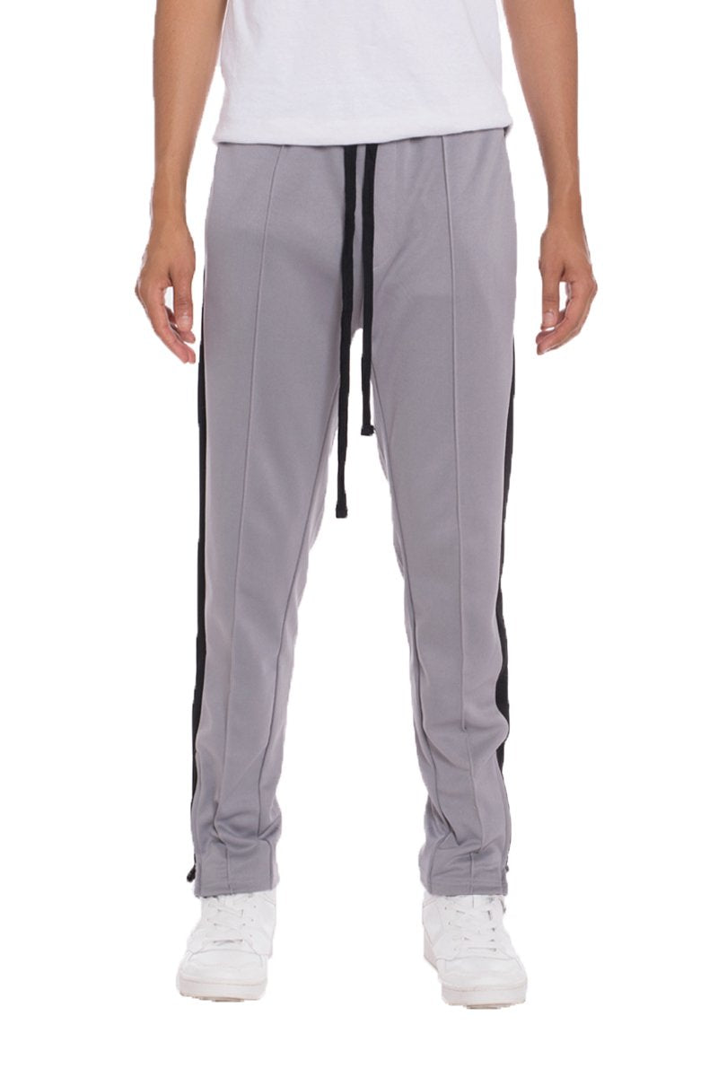 Grey Lime Milo striped track pants with elastic waistband and tapered fit, perfect for casual wear and athletic activities.