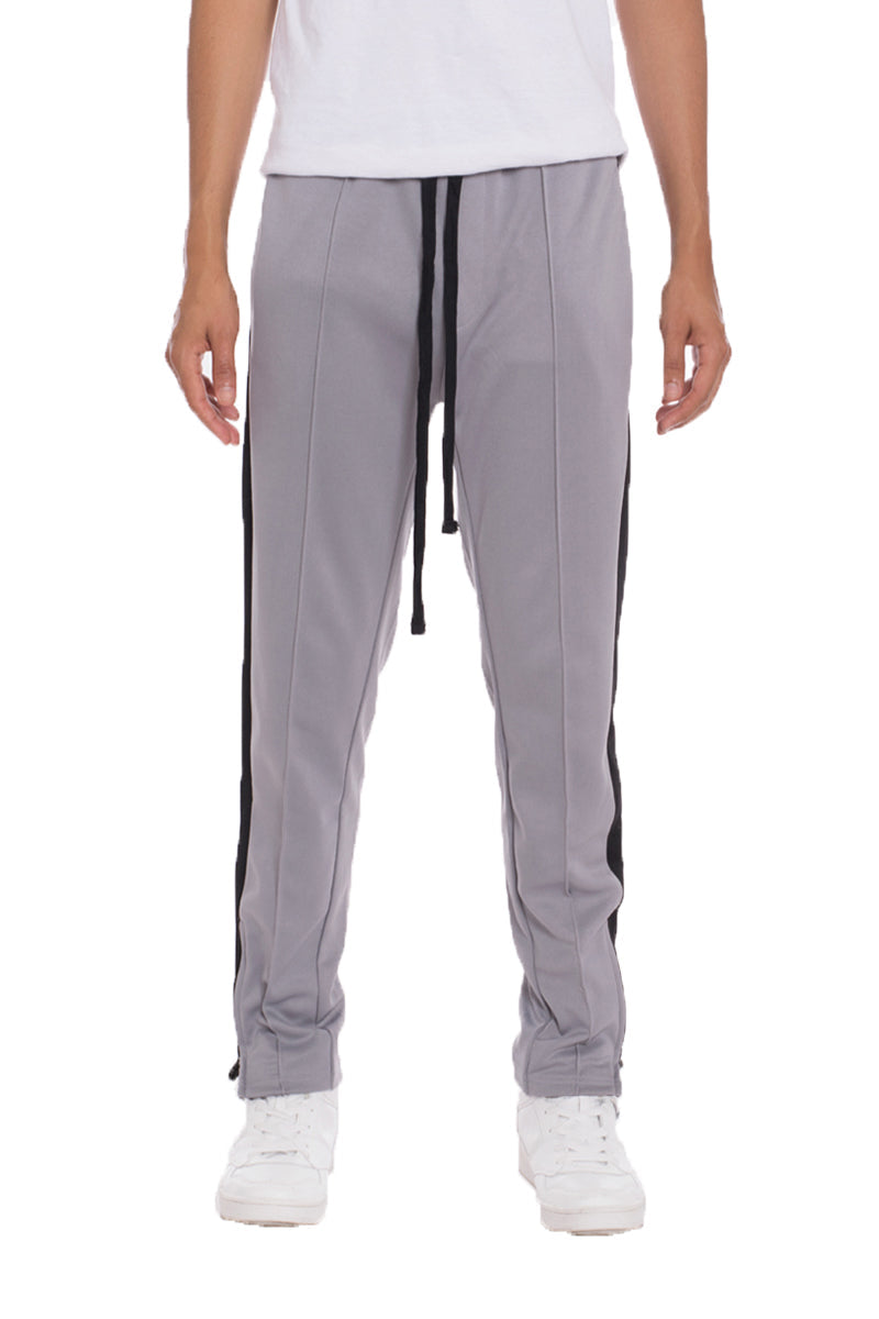 Grey Lime Milo tricot sweat pants laid flat, showing elastic waistband and relaxed fit, perfect for casual wear.
