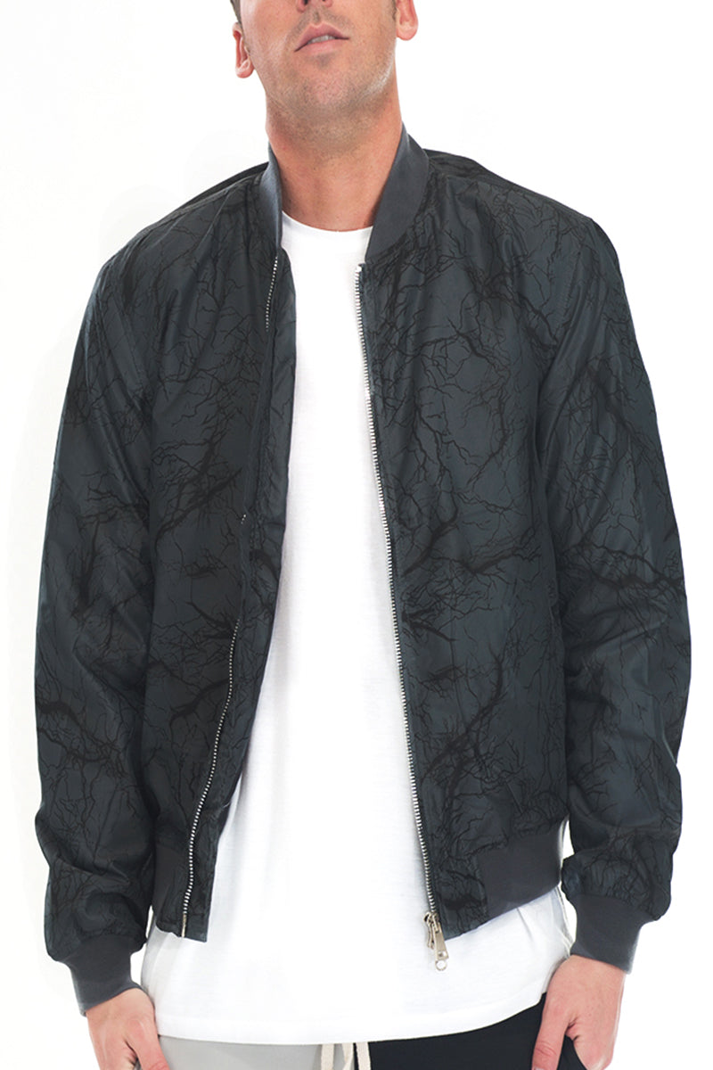 Lime Milo Bolt Print Bomber jacket with bold geometric design, front zipper, and ribbed cuffs and hem.