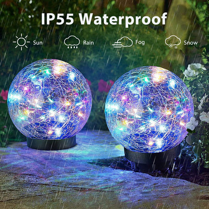 Pink Iolaus outdoor solar crack bottle 20-light waterproof decorative lighting illuminated at night.