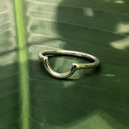 Silver half moon ring by Ariel featuring a sleek, minimalist design perfect for everyday wear.