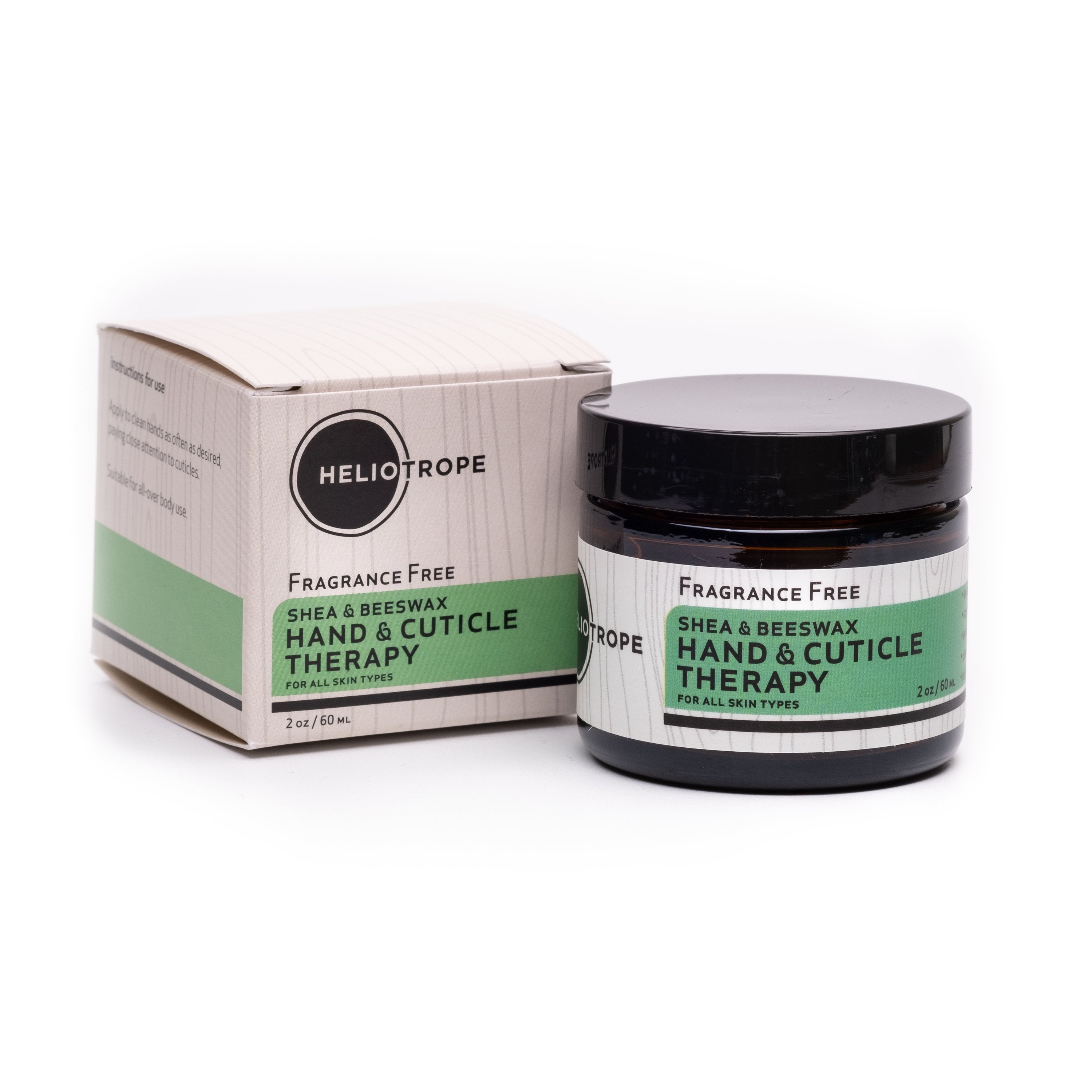 Orange Leto Shea &amp; Beeswax Hand &amp; Cuticle Therapy applied to a hand, showing nourishing balm for skin and cuticle care.