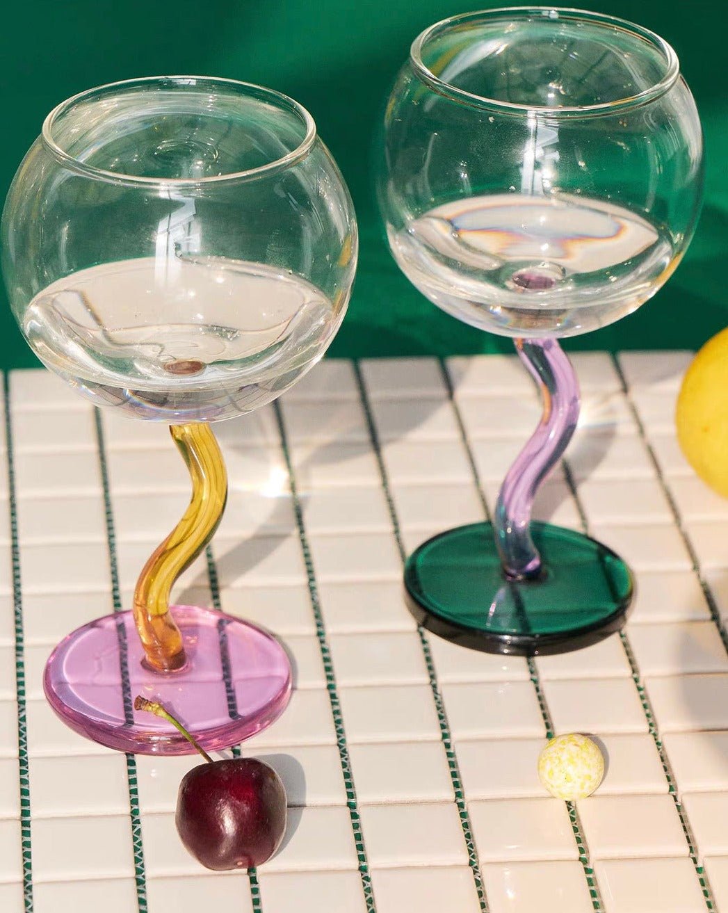 Handblown Bubble Wine Glass by Inspecial Home featuring a retro wavy stem and whimsical burgundy glass for home decor.