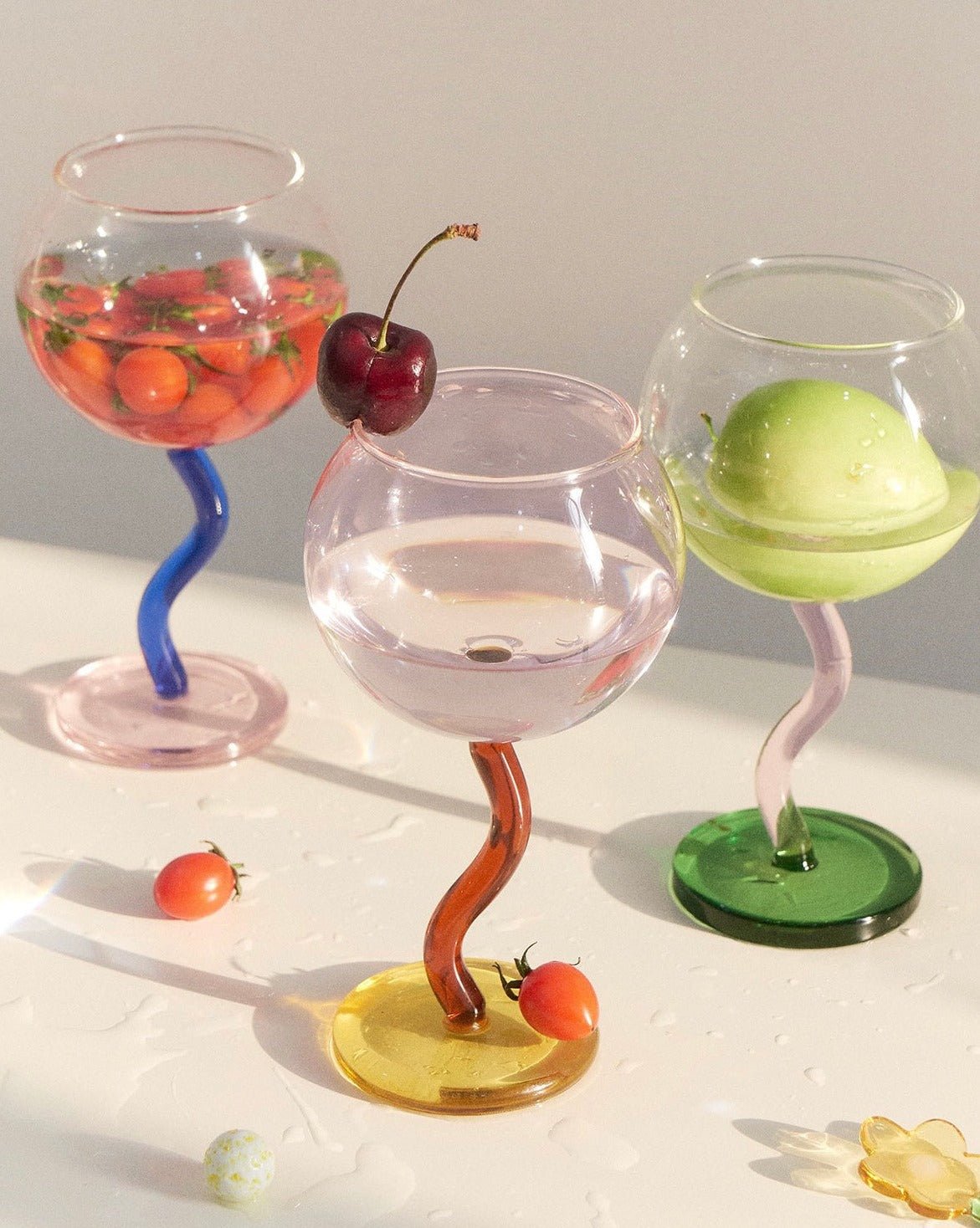 Handblown bubble wine glass with a wavy stem, retro design, Burgundy color, perfect for eclectic home decor.