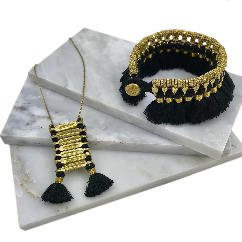 Handmade Kyra Tassel Bracelet by Ariel featuring colorful tassels and beaded details, crafted with fair trade materials.