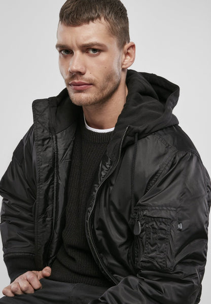 Callisto hooded MA1 bomber jacket with a zip-up front, ribbed cuffs, and a hood, stylishly displayed on a hanger.